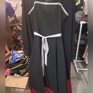 Tea length, a line formal dress with silver beading around the top. Size 10.